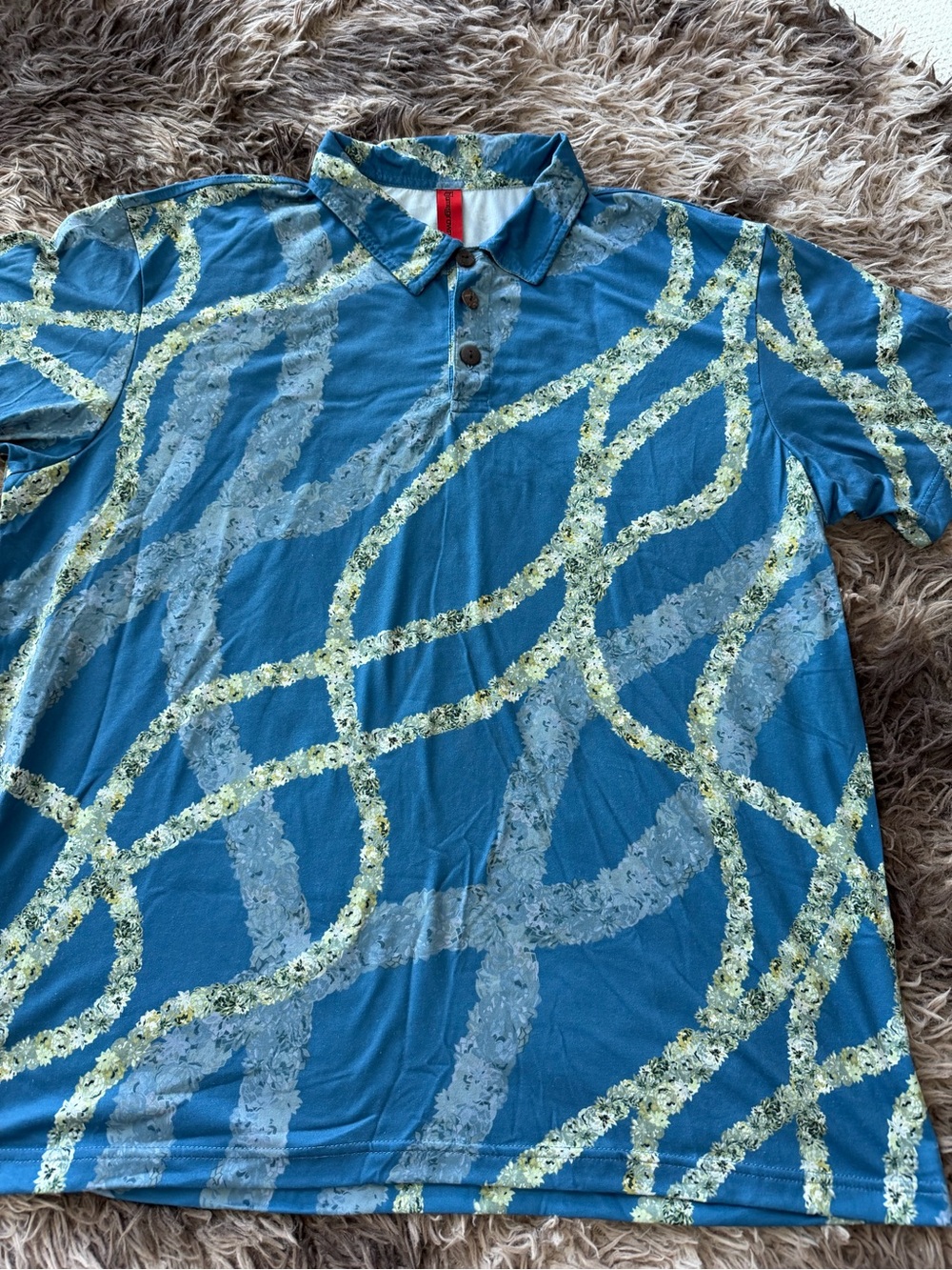 Men's Blue Printed Polo with lei patter